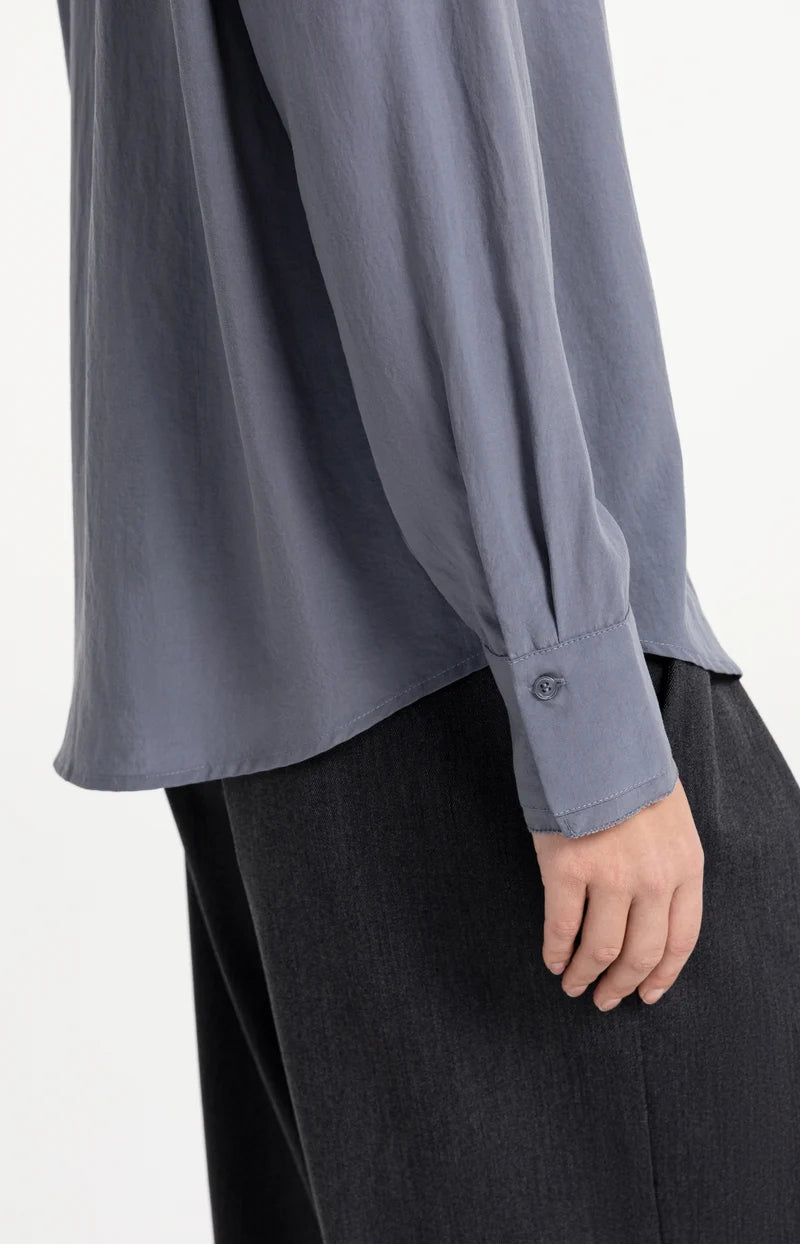 Chemisier avec détail au col et manches longues